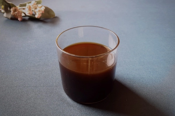 Plain coffee jello in a small glass
